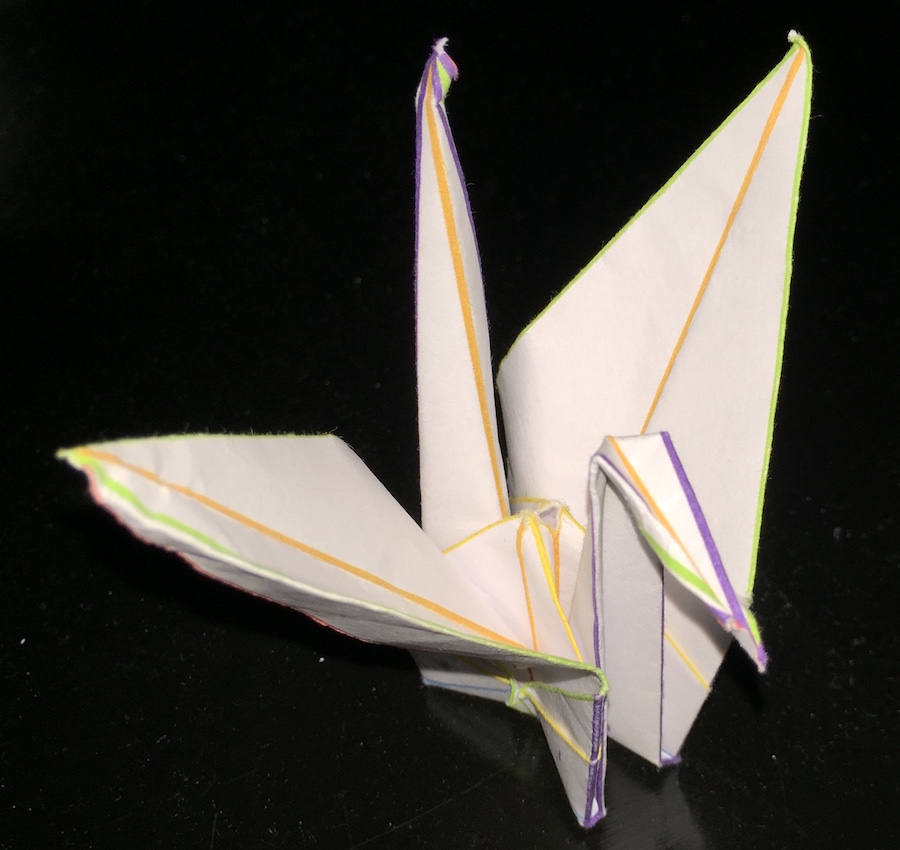 the second image folded to form a crane